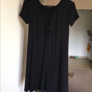 Small black dress with cross ties in the front